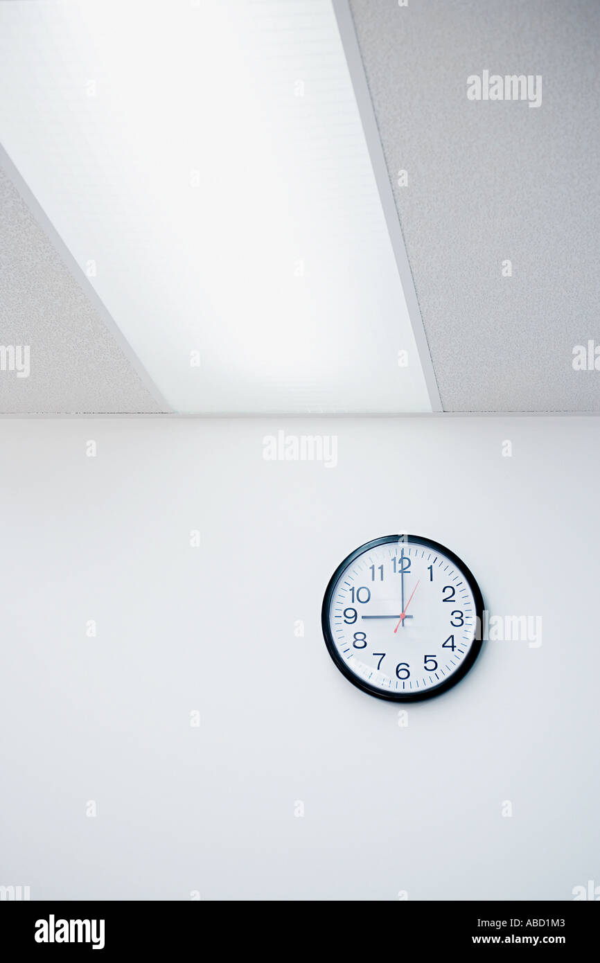 Clock on office wall Stock Photo Alamy