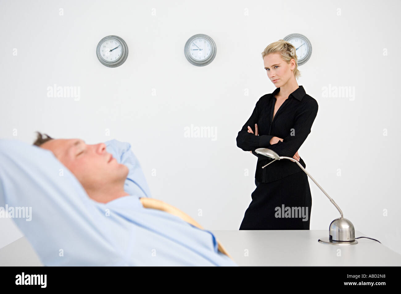 Businessman sleeping arms crossed hires stock photography and images