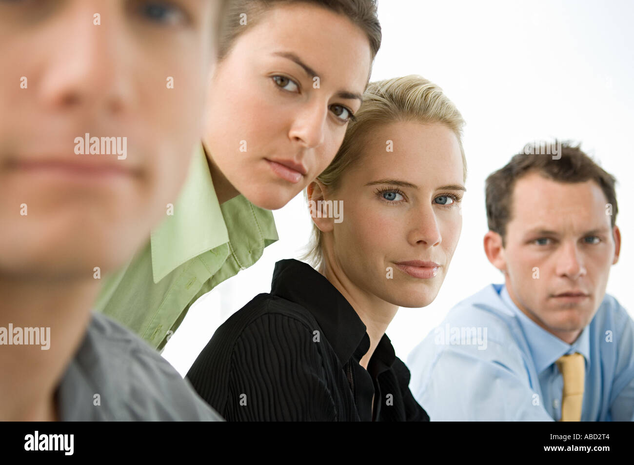 Portrait of four office workers Stock Photo - Alamy