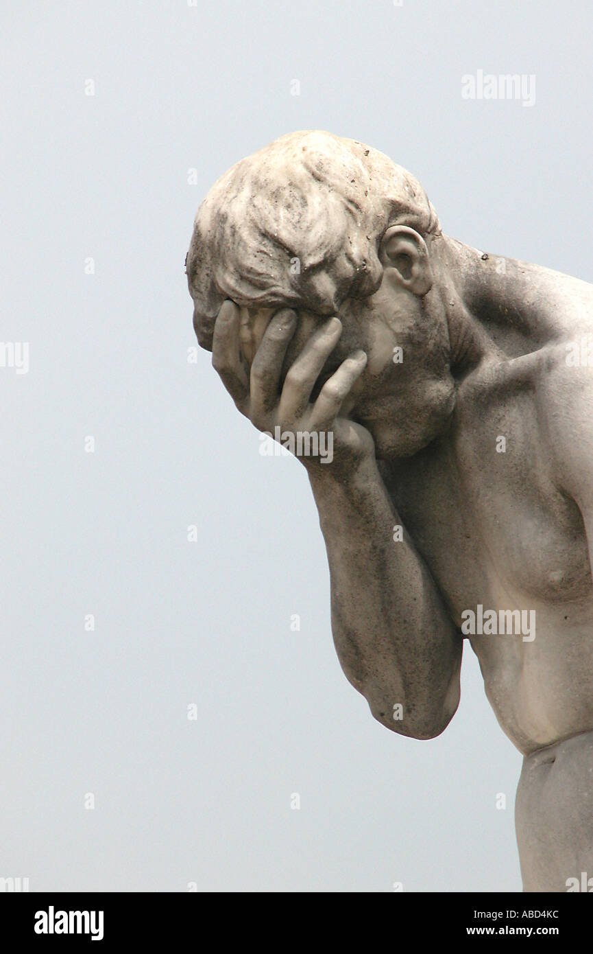 Statue with desperate expression Stock Photo