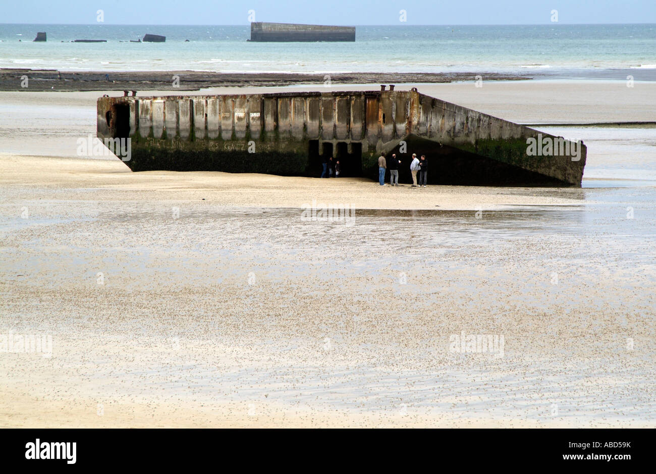 Arromanches Normandy France Remains of Mulberry Harbour on Gold Beach Stock Photo