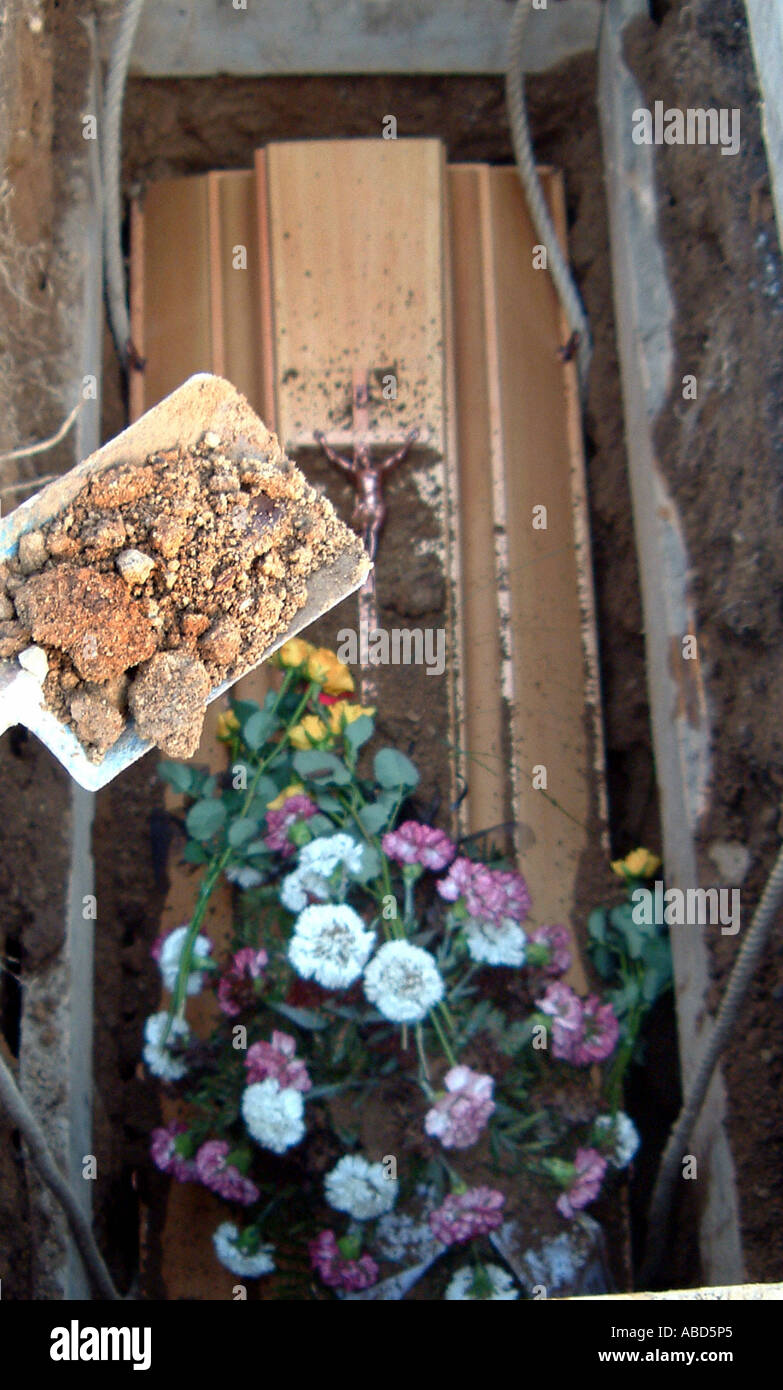 Coffin with shovel and earth Stock Photo Alamy