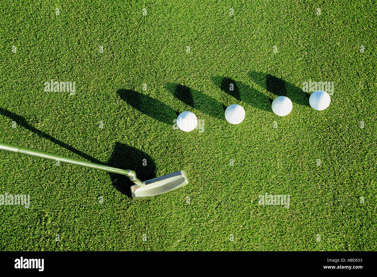 Golf stick and balls Stock Photo