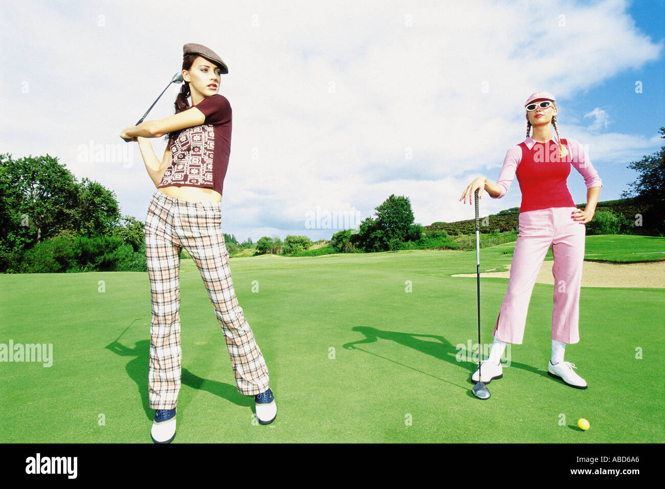 Women playing golf Stock Photo