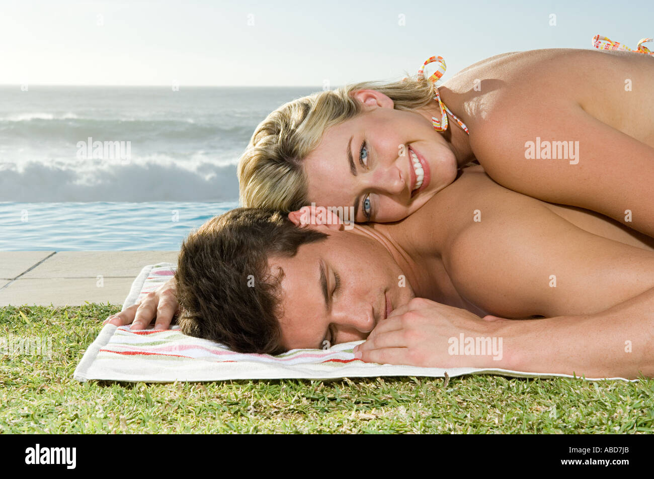 Woman lying on her boyfriend Stock Photo