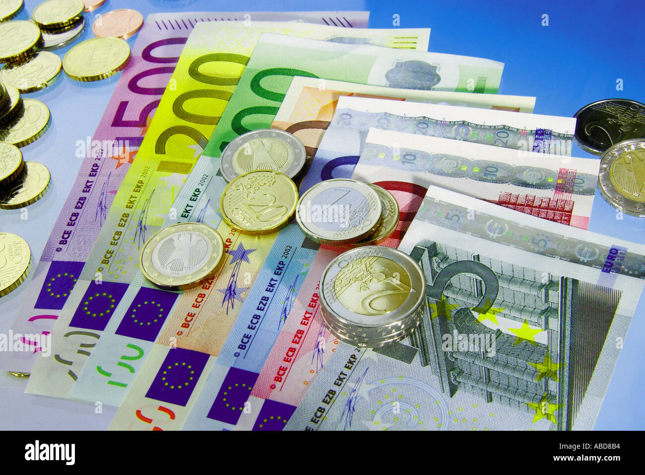 Euro notes and coins Stock Photo