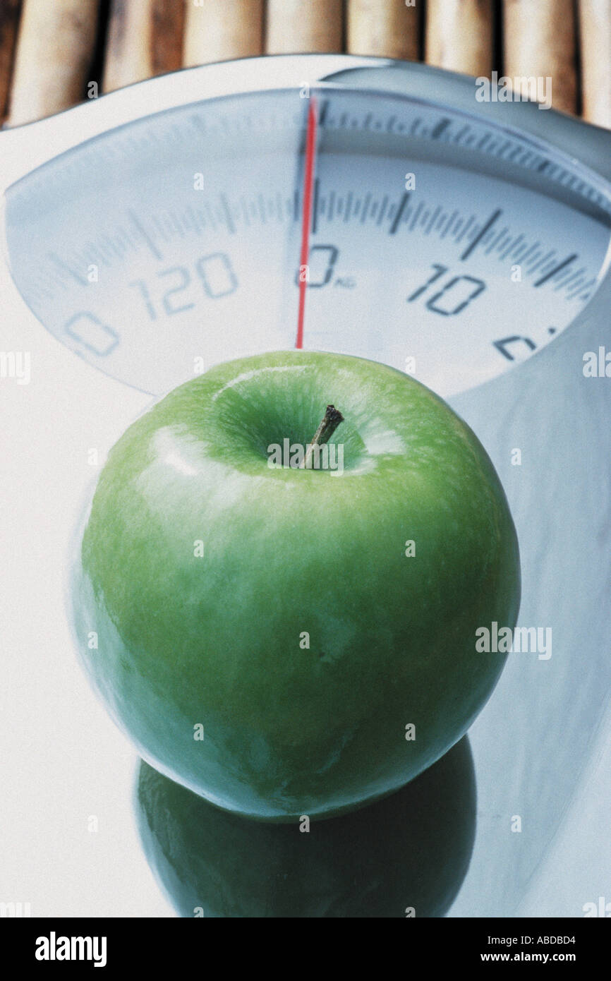 Apple and scales Stock Photo Alamy