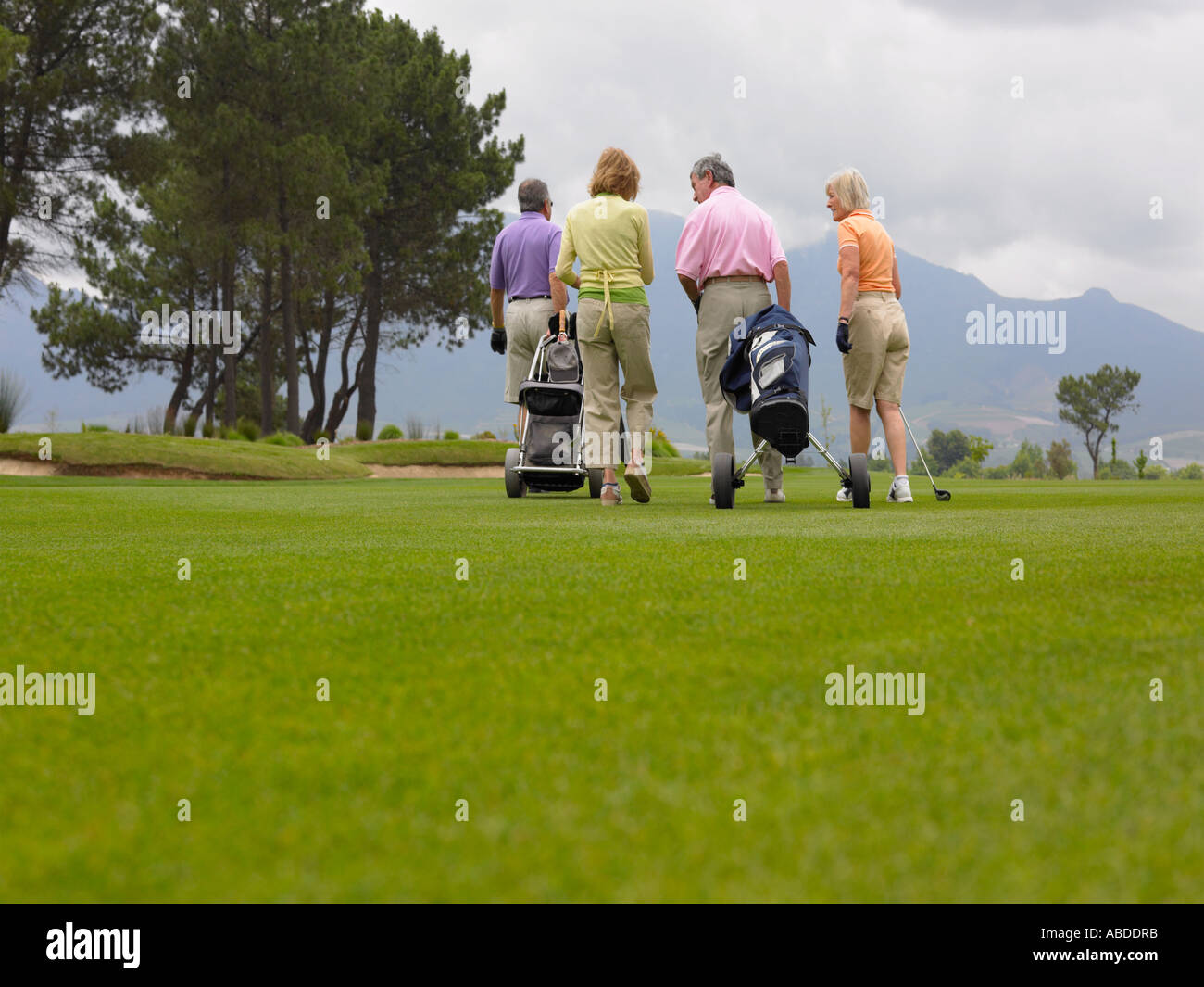 Golfers Stock Photo - Alamy
