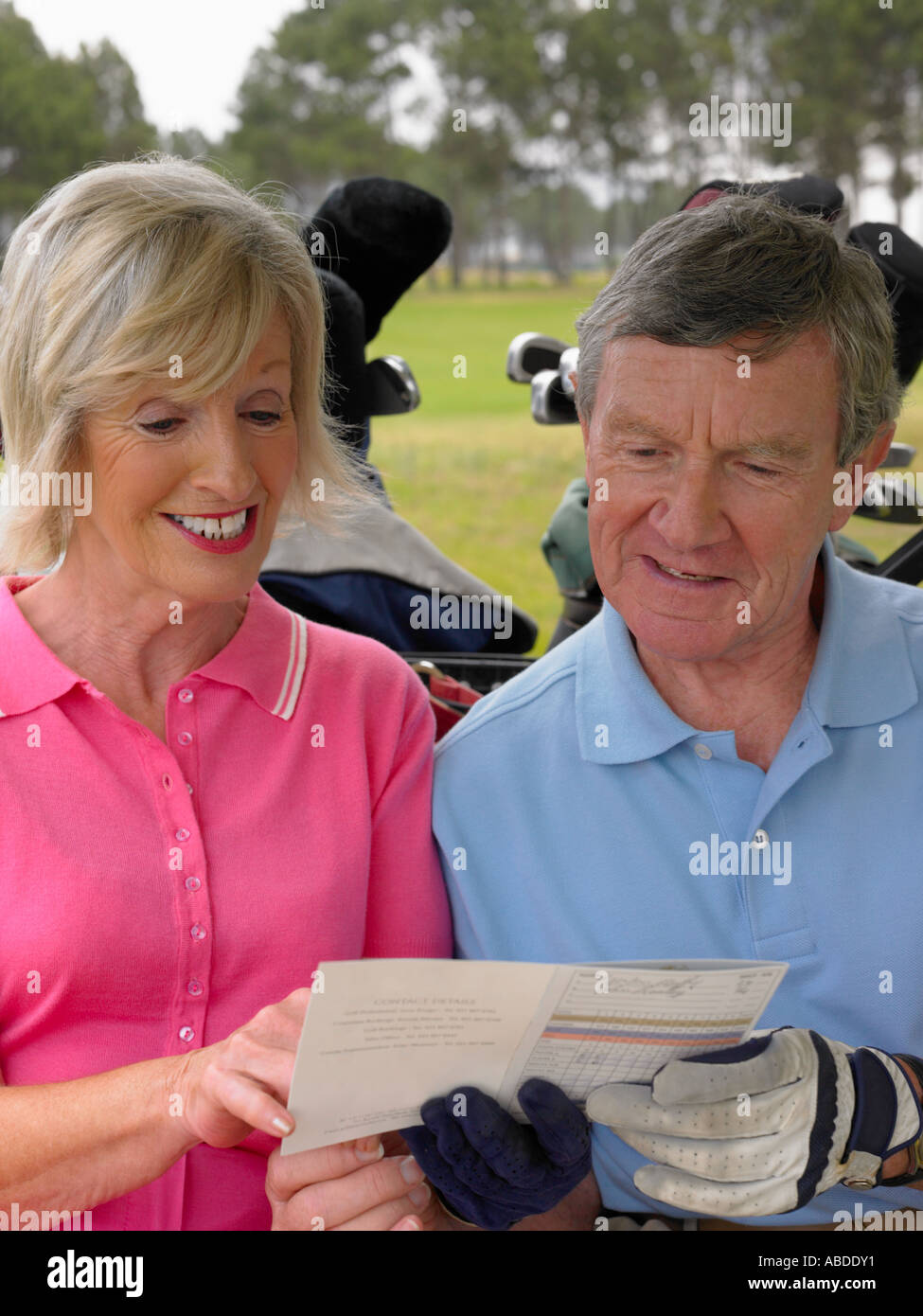 Couple with golf score card Stock Photo