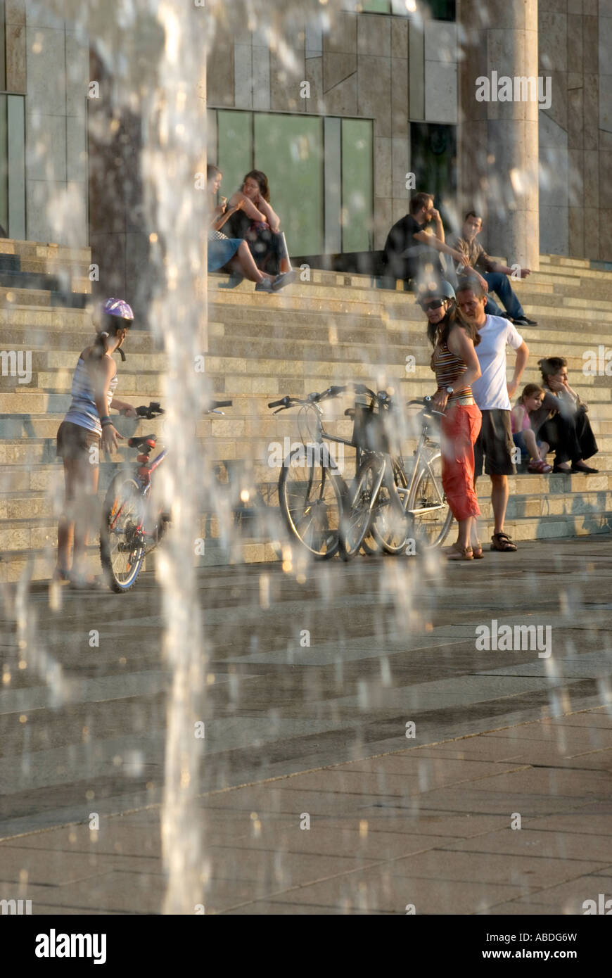 Fountain and People at the Palace of Arts Muveszetek Palotaja Budapest Hungary Europe Stock Photo