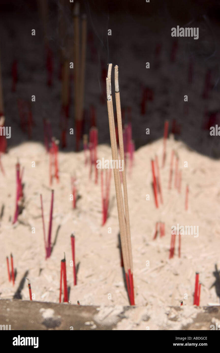 Burning joss sticks in buddhist hi-res stock photography and images - Alamy