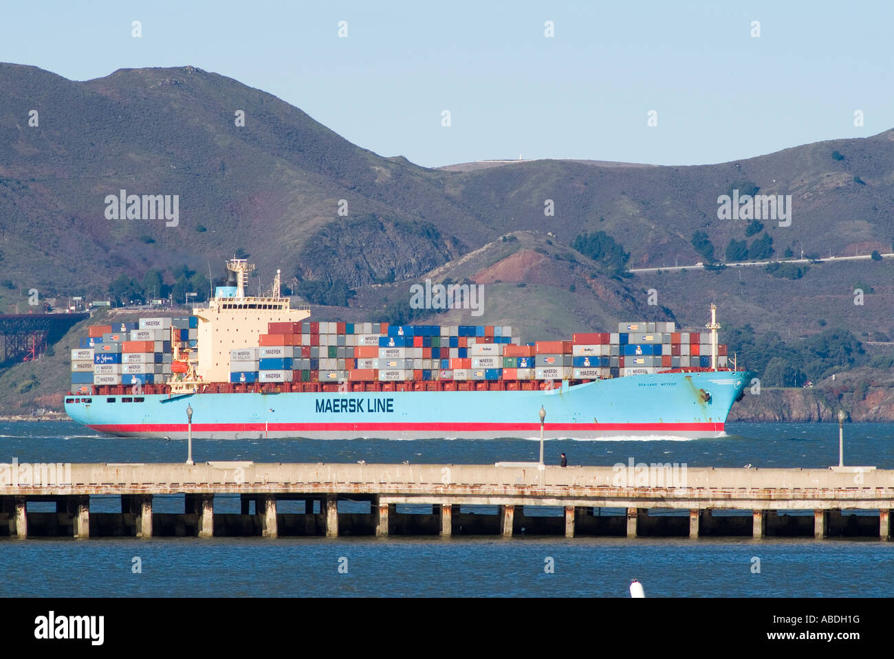 Massive container ship traveling through San Francisco harbor ...