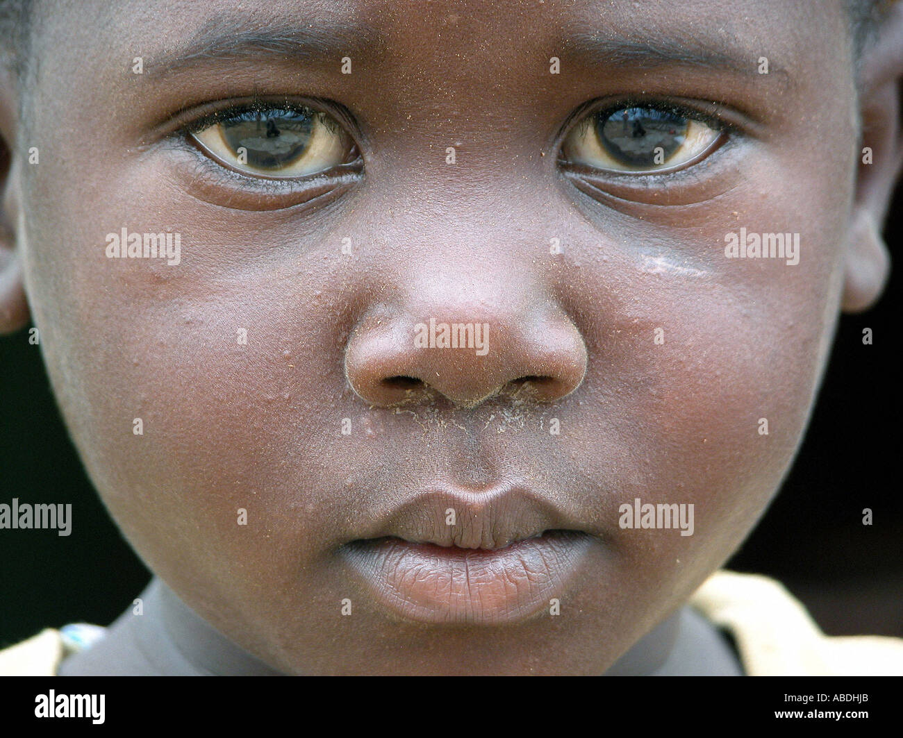 sternly looking African child Stock Photo