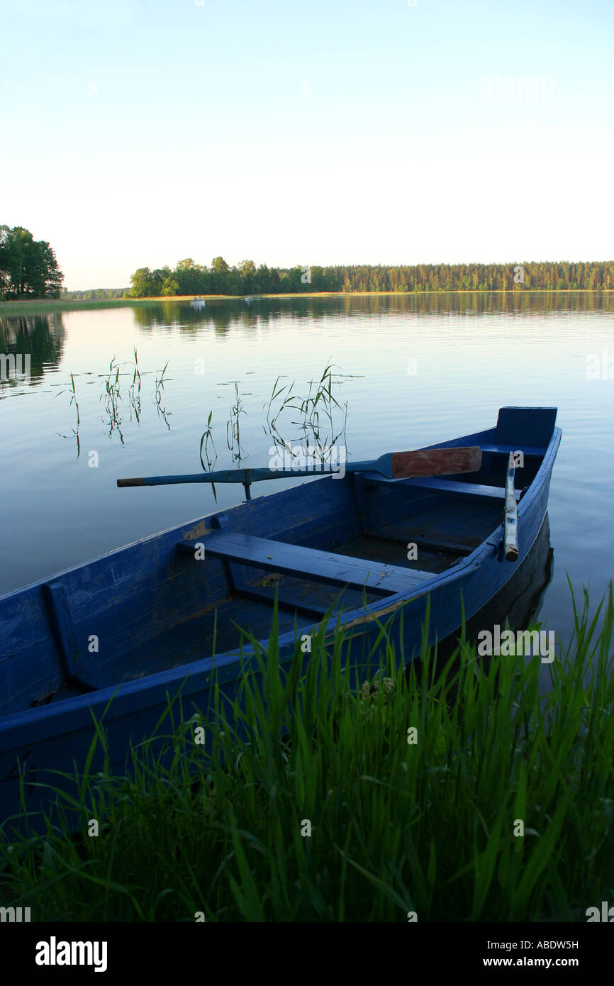Blue fishing boat Stock Photo - Alamy