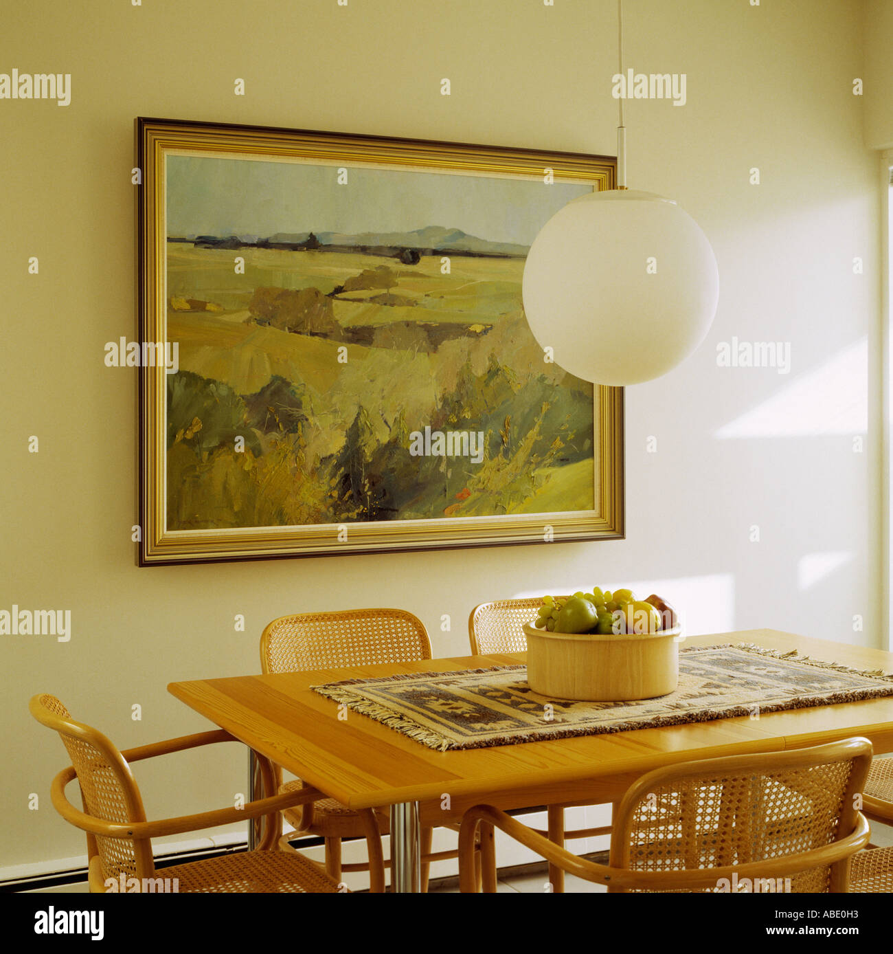 Dining Room with Picture Hanging on the Wall Stock Photo - Alamy