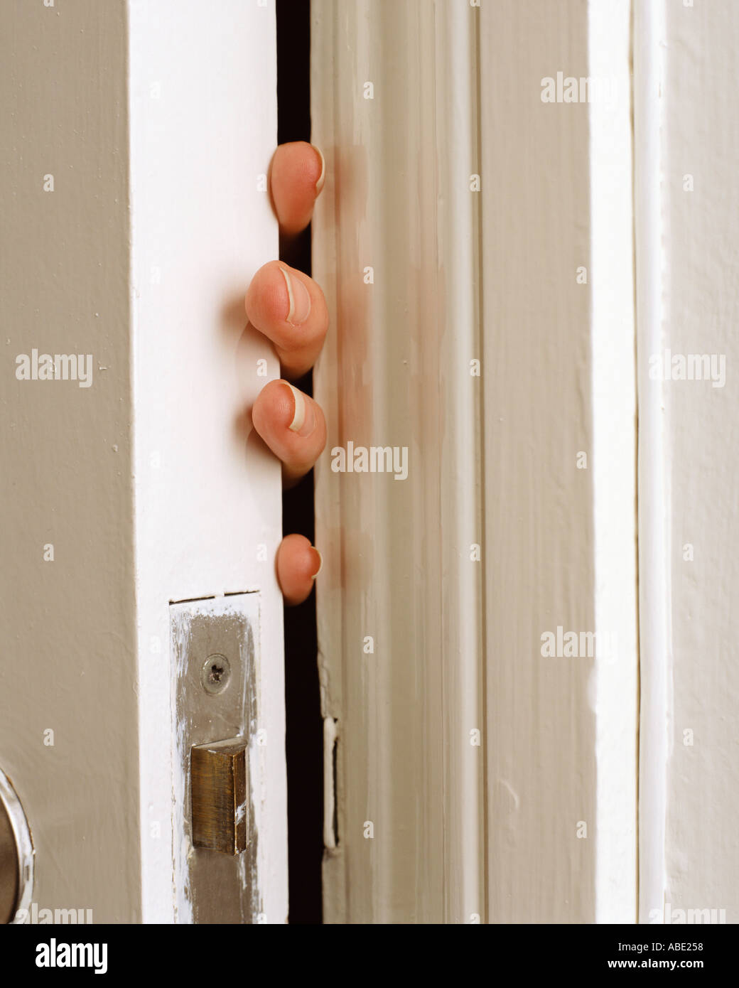 Quietly opening a door Stock Photo Alamy
