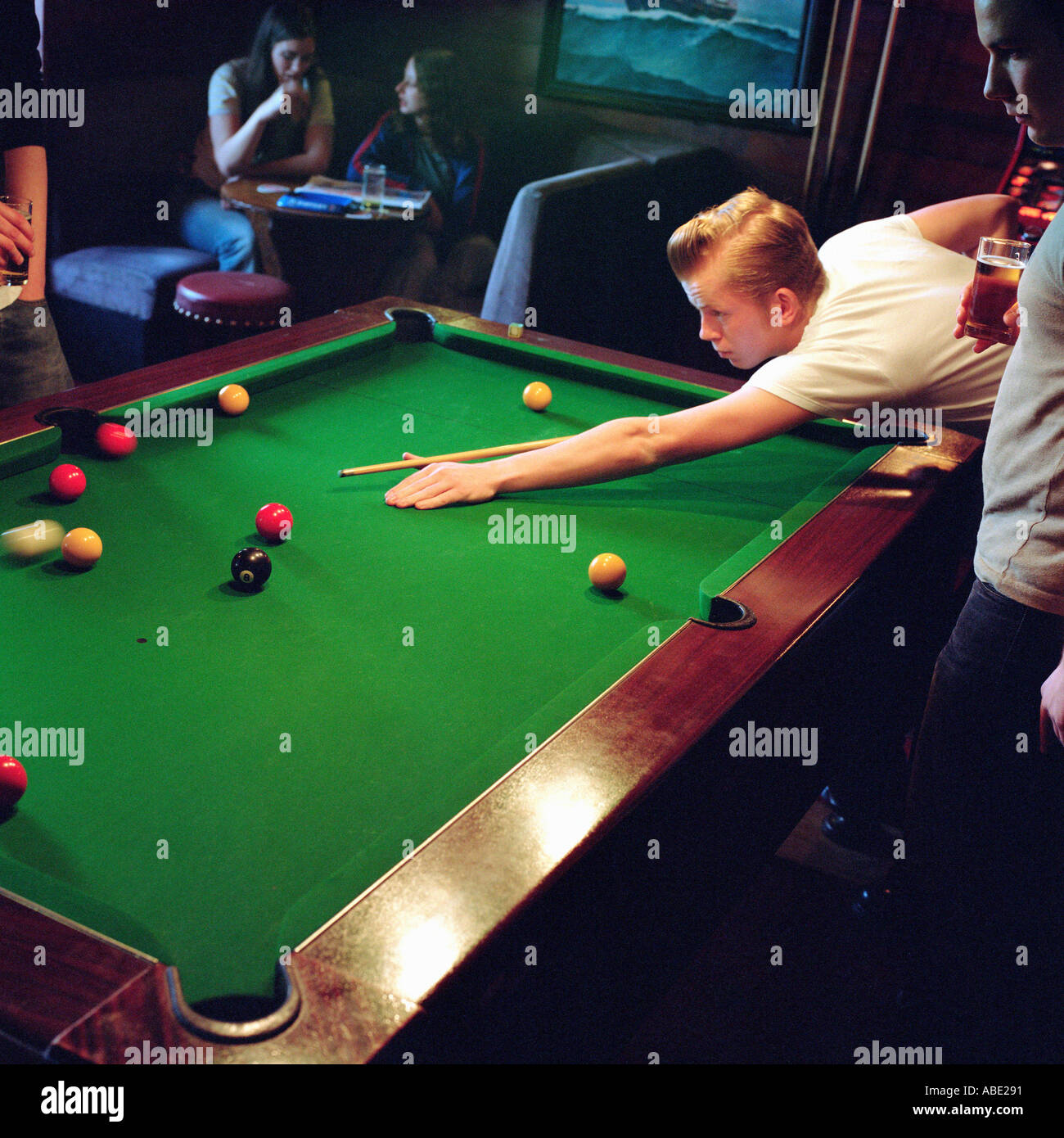 Men playing pool Stock Photo