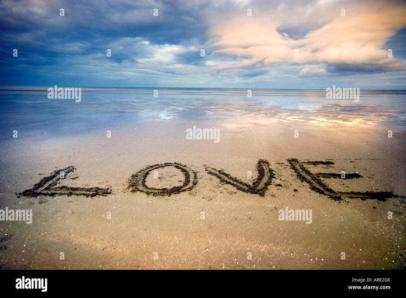 Love written on a beach Stock Photo - Alamy