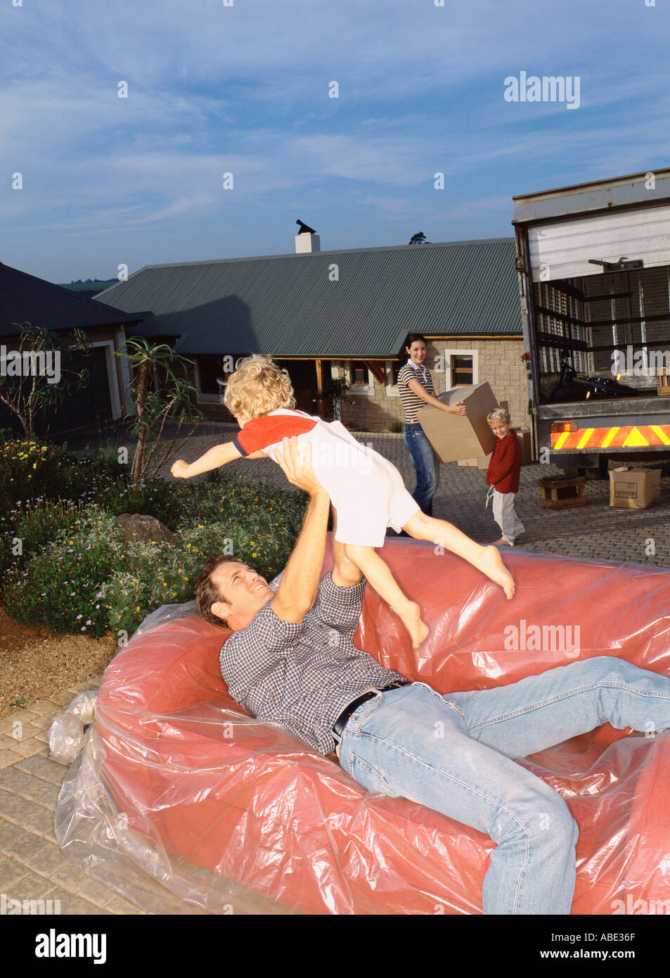 Family moving house Stock Photo