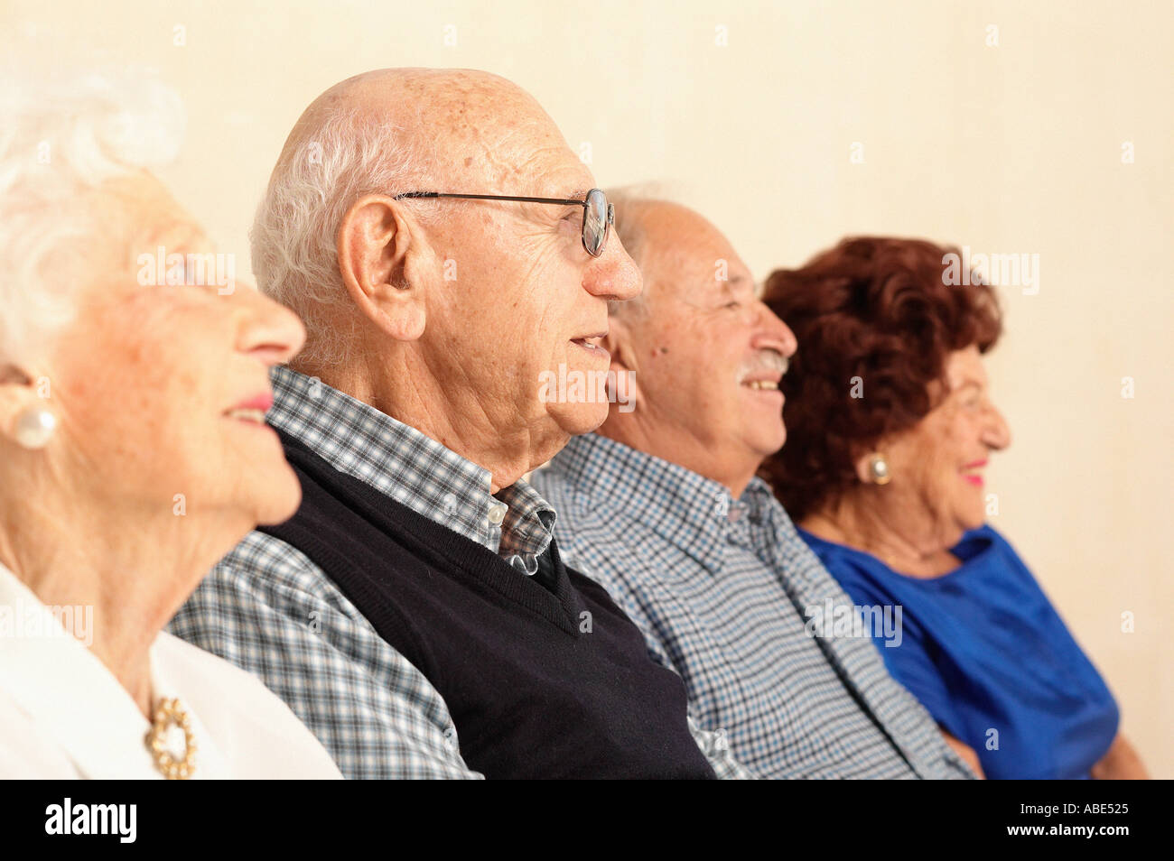 Profiles of elderly people smiling Stock Photo