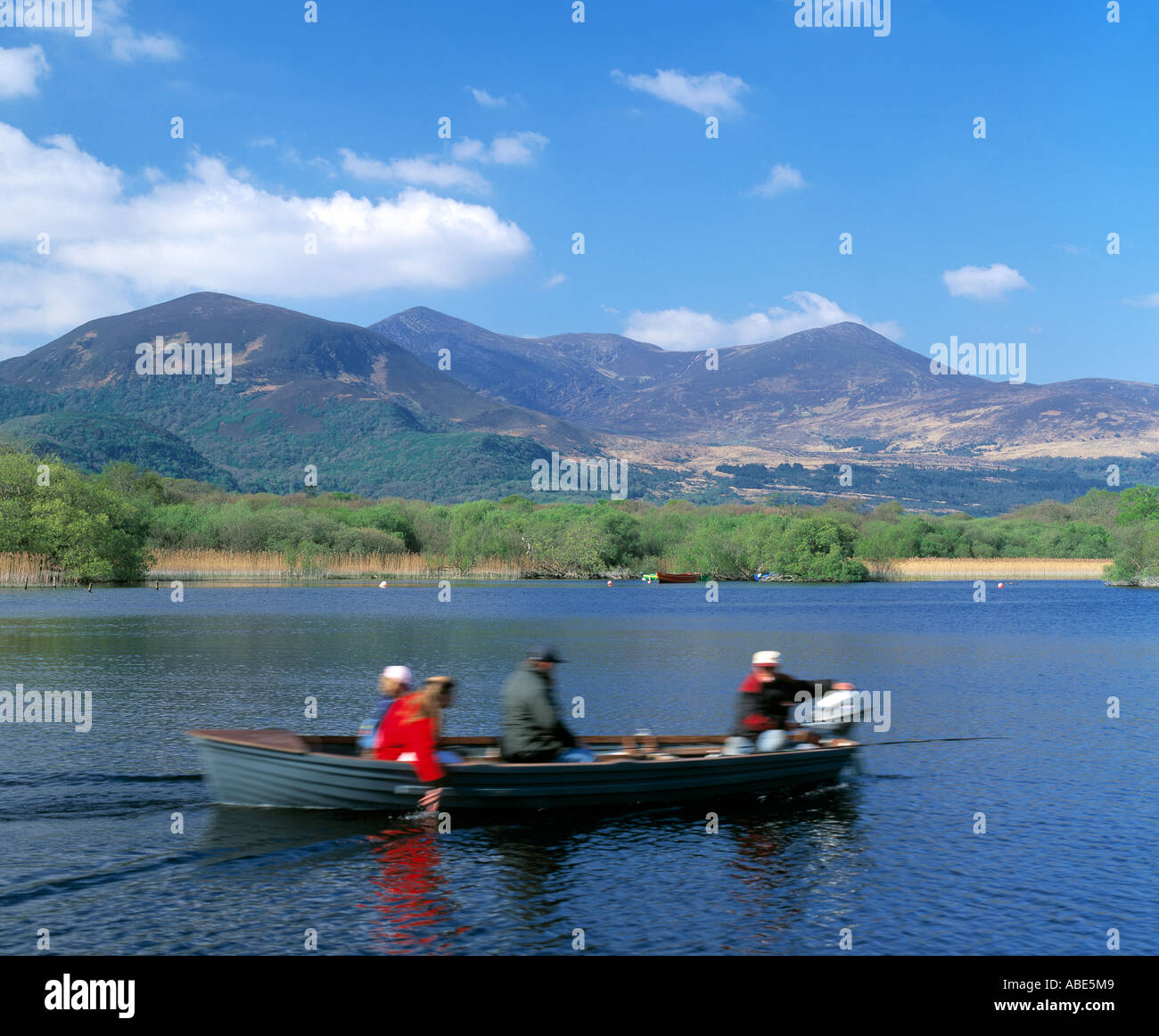 boating boat ride on killarney lakes Stock Photo Alamy