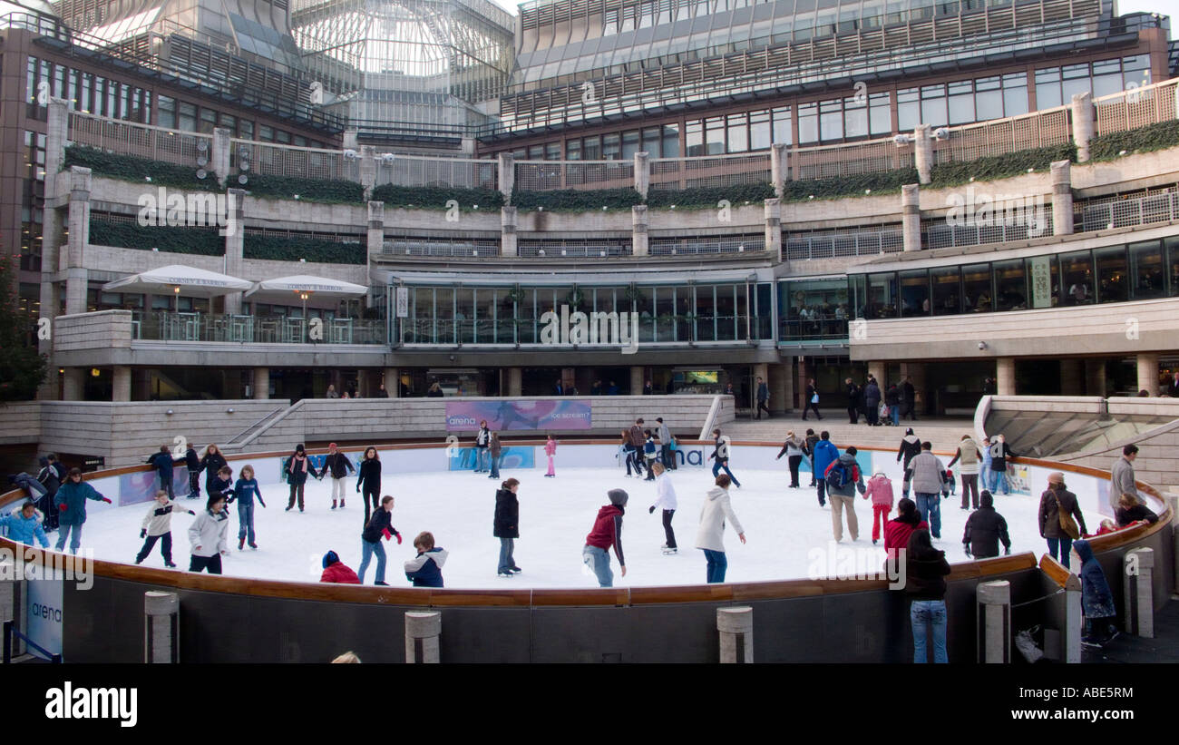 Ice skating at Broadgate Circus London UK Stock Photo
