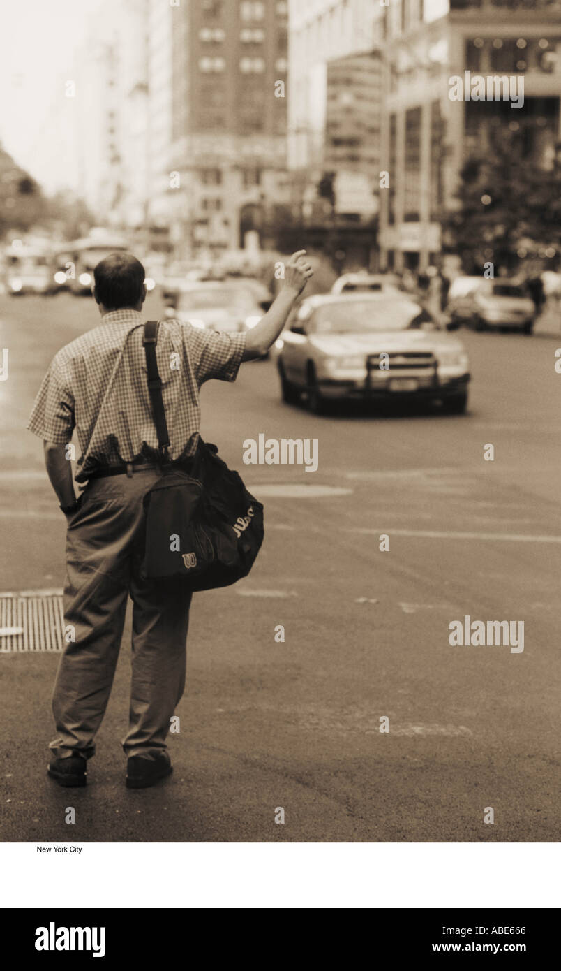 Man hailing a cab Stock Photo Alamy
