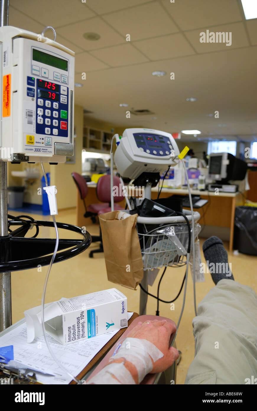 Patient receiving intravenous immunoglobulin treatment in a hospital IV