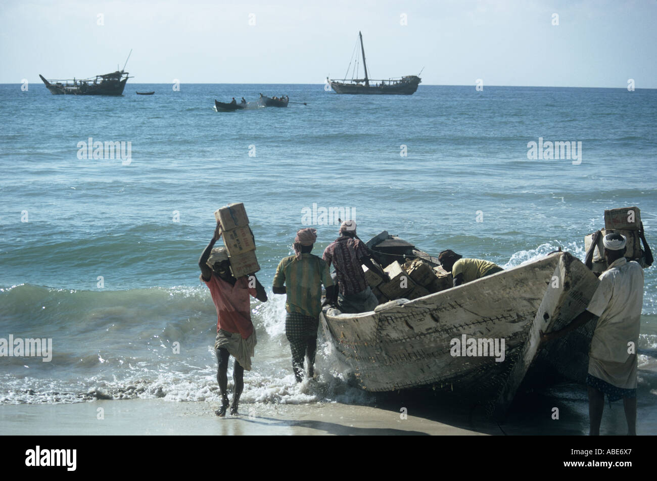 In Salalah, Oman, before a harbour was buit, cargoes were carried from ship to shore by stitched surfboats Stock Photo