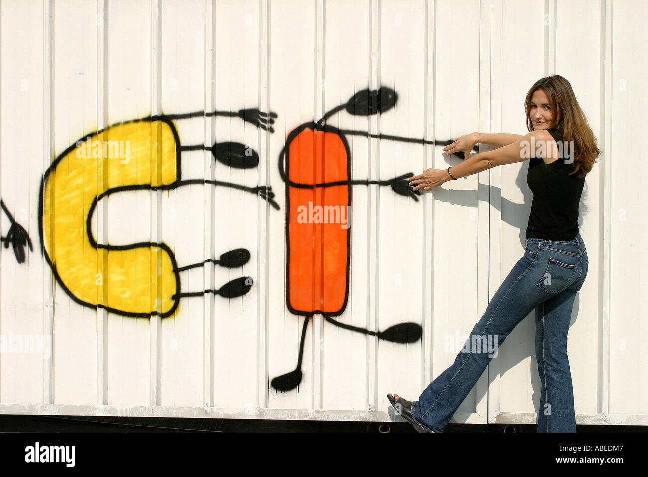 Young woman with Graffiti Stock Photo