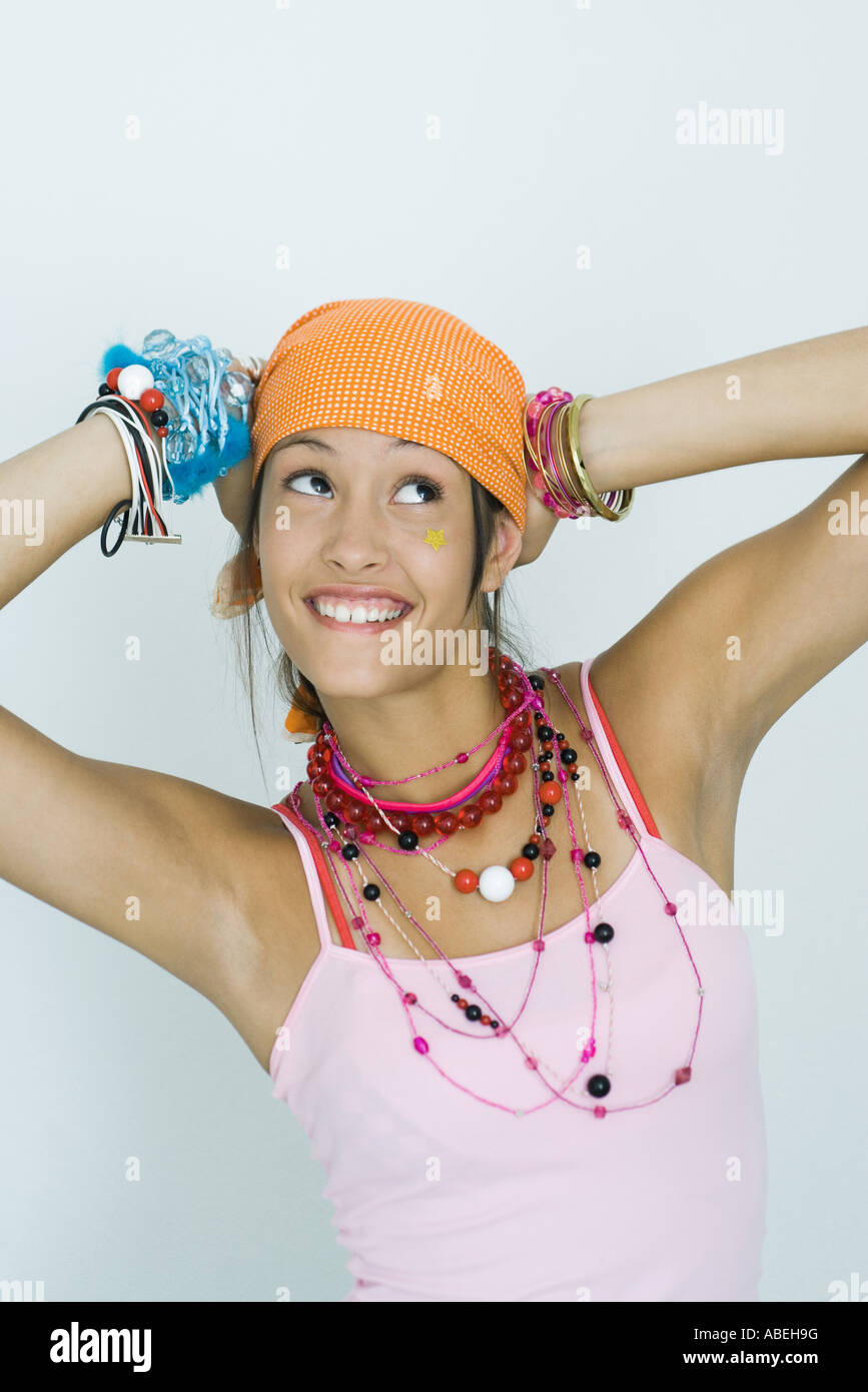 Portrait Of A 13yearold Girl Wearing A Lot Of Necklaces, Bangles
