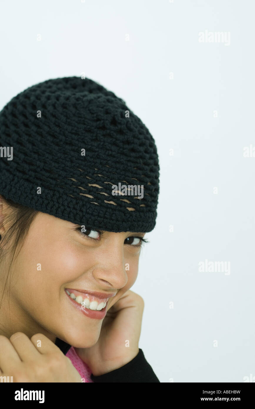 Teenage girl wearing knit hat, portrait Stock Photo Alamy