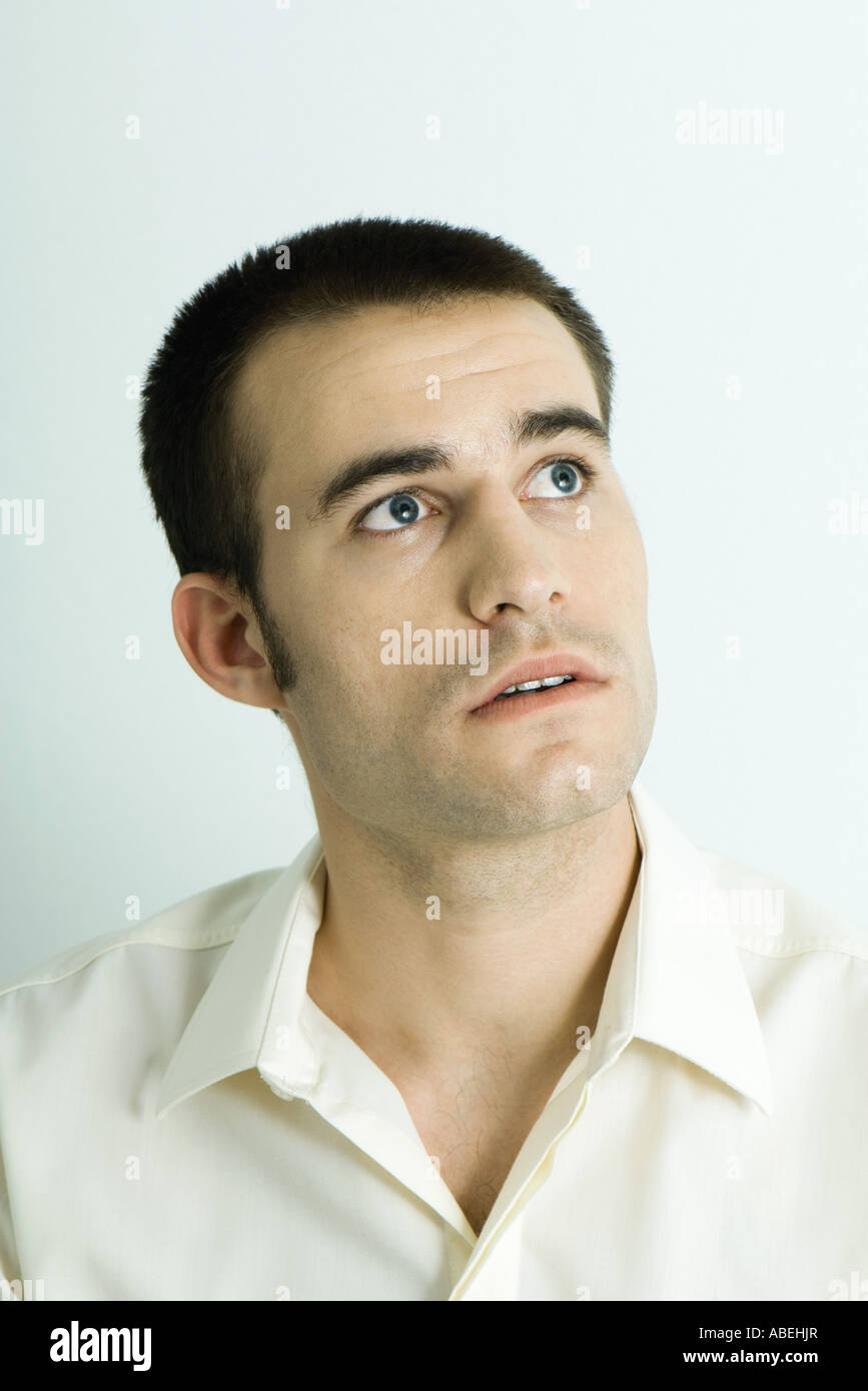 Man looking away, head and shoulders, portrait Stock Photo - Alamy