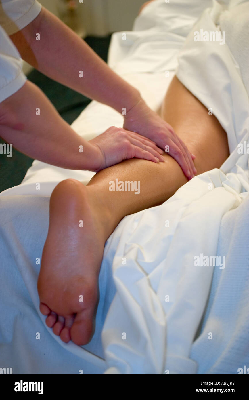 Relaxing Leg Massage Therapy in a Calming Spa Environment Stock Photo