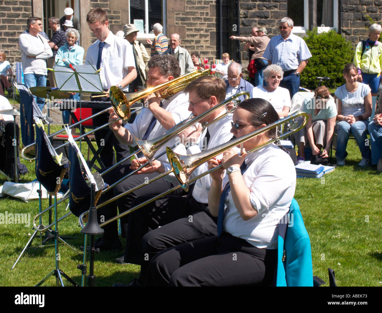 Brass band playing on village green in Rivington Lancashire Stock Photo