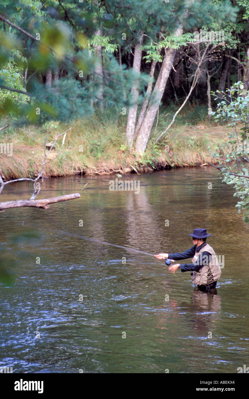 Fly fishing in river Stock Photo