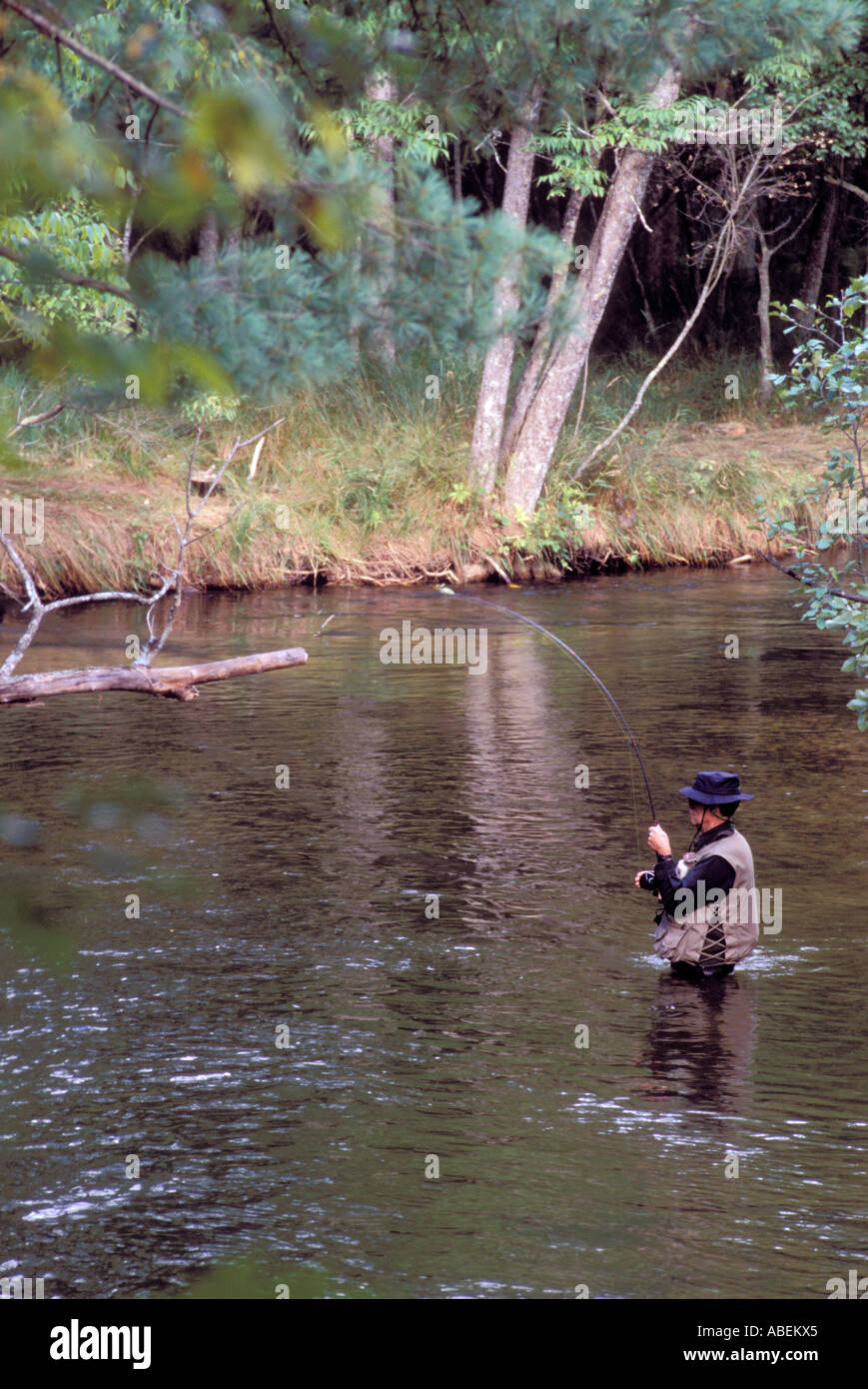 Fly fishing in river Stock Photo