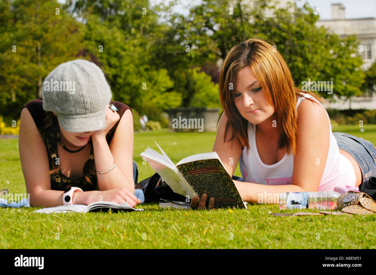Cardiff University students relaxing & chatting on the lawn at the