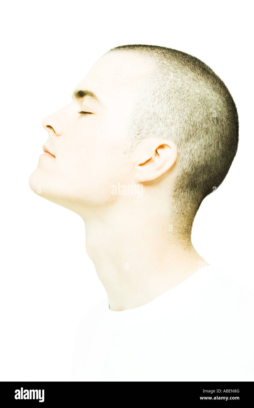 Young man's head, eyes closed, profile Stock Photo