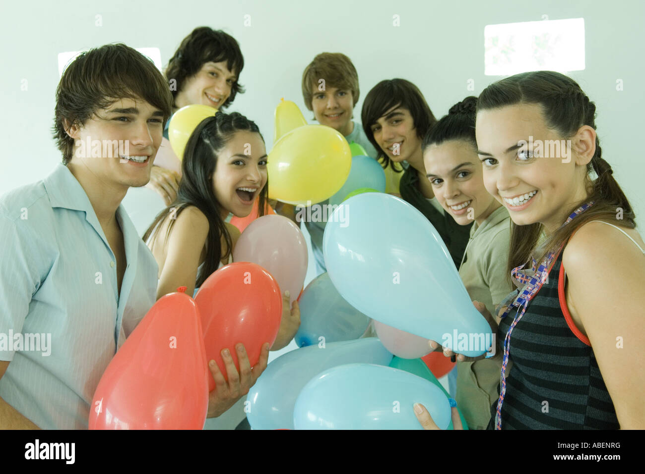 Group of young friends with balloons Stock Photo