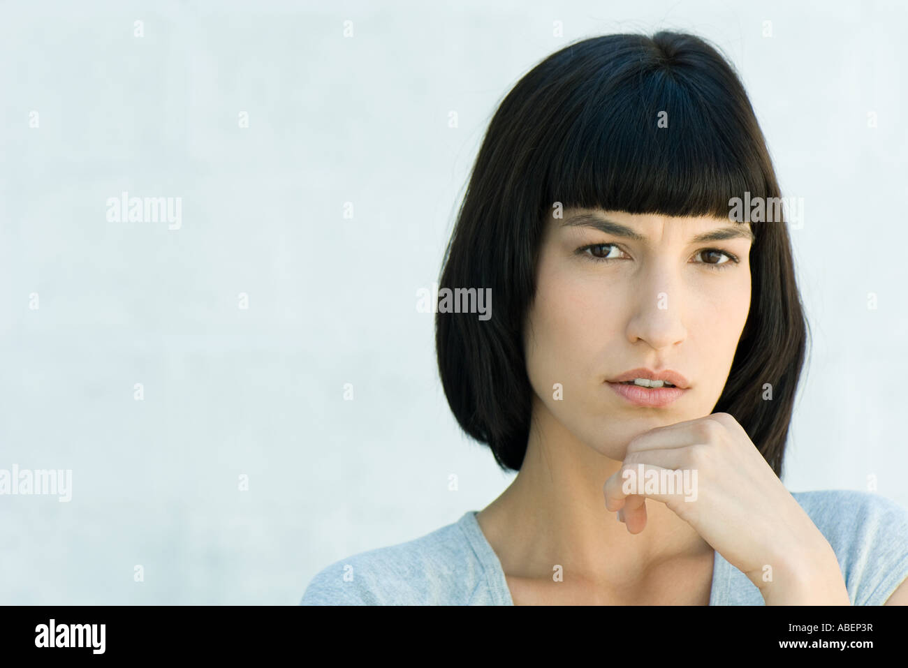 Woman, hand under chin, portrait Stock Photo Alamy