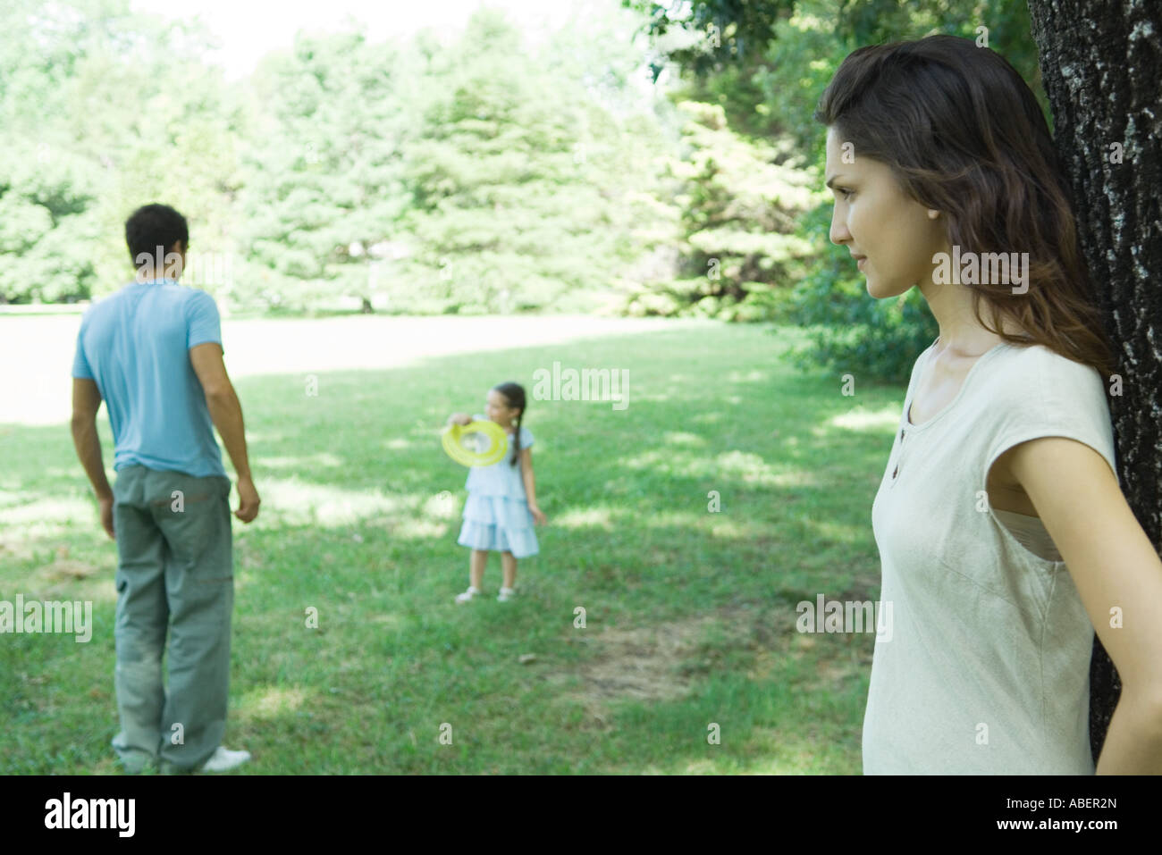 Family playing outdoors Stock Photo - Alamy