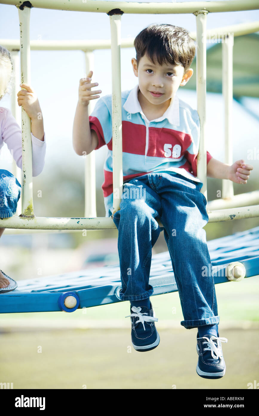 Children on playground equipment Stock Photo