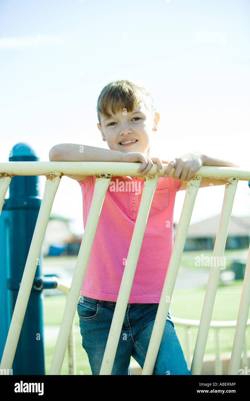 Child on playground equipment Stock Photo