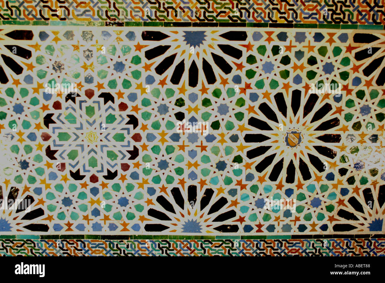 Intricate patterned ceramic tiling in moorish palace Alhambra Granada