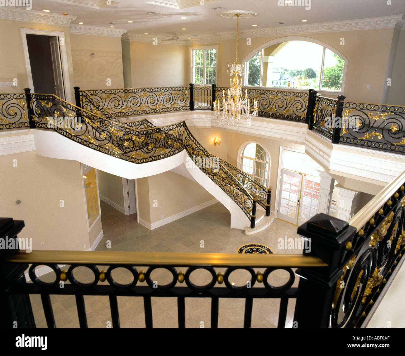 Grand staircase resitential estate home Stock Photo Alamy