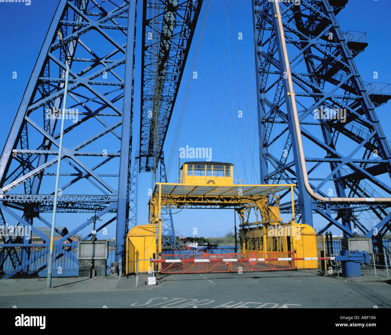 The suspended travelling car and Transporter Bridge over the River Tees, Middlesbrough, Cleveland, England, UK. Stock Photo