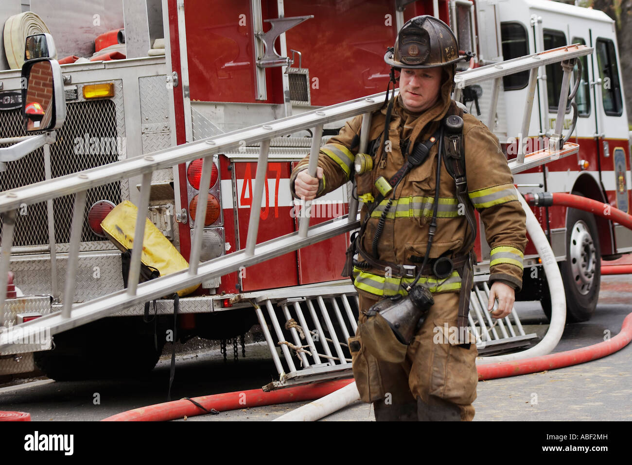 Female firefighter hose hires stock photography and images Alamy