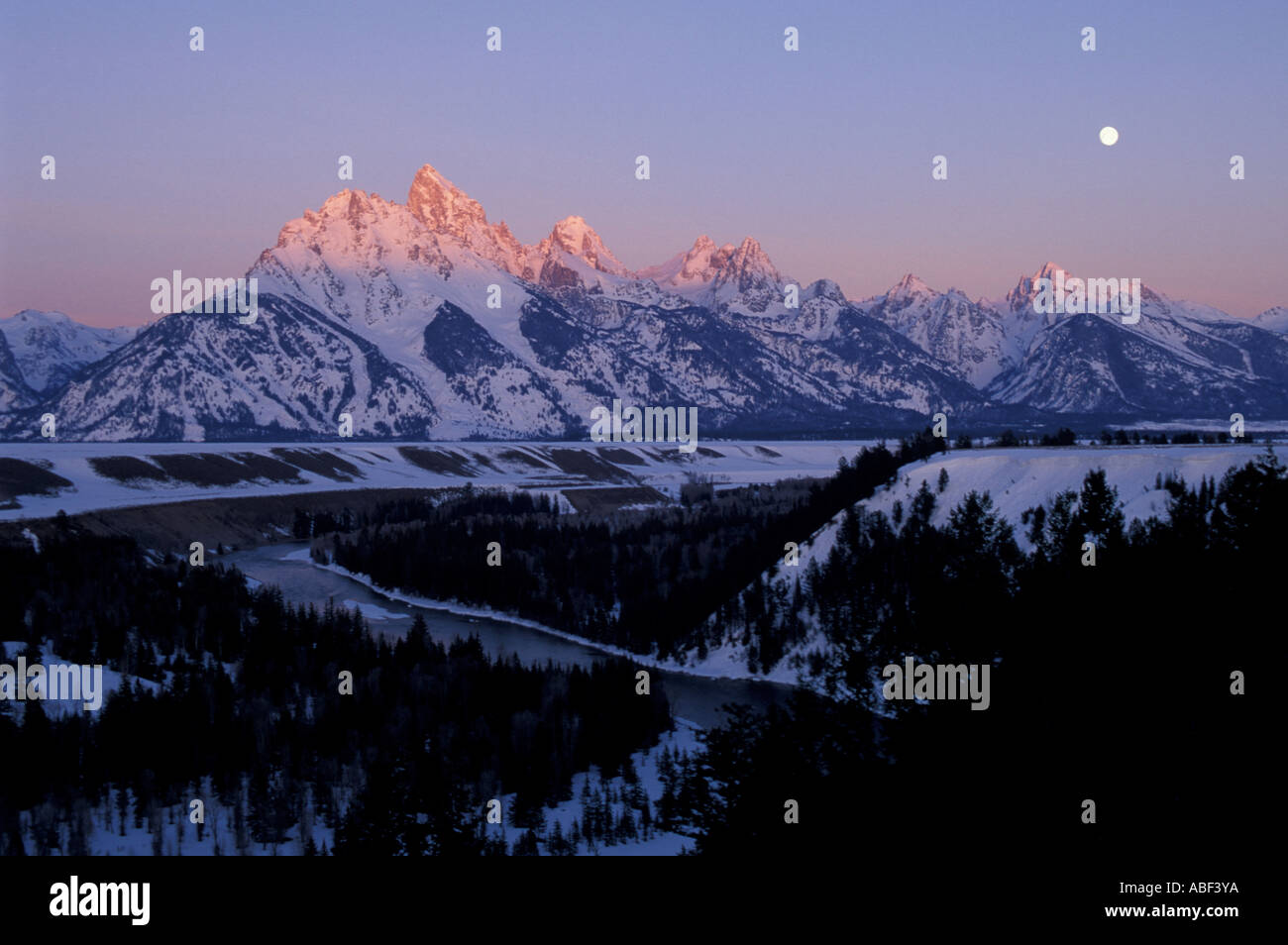 Snake River Overlook Grand Teton N P A full moon sets behind the Tetons