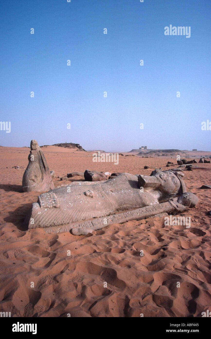 The fallen statue of Ramses at Wadi al-Sebua. Upper Egypt / Nubia, Egypt. The fallen statue of Ramses at Wadi al-Sebua.  When Wadi al-Sebua was moved to save it from the rising waters of Lake Nasser this fallen statue was moved to the same relative possition some 100 metres from the actual temple. Stock Photo